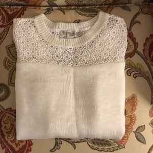 Beautiful cream sweater with split back!